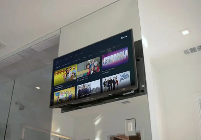 TV installation in residential bathroom.