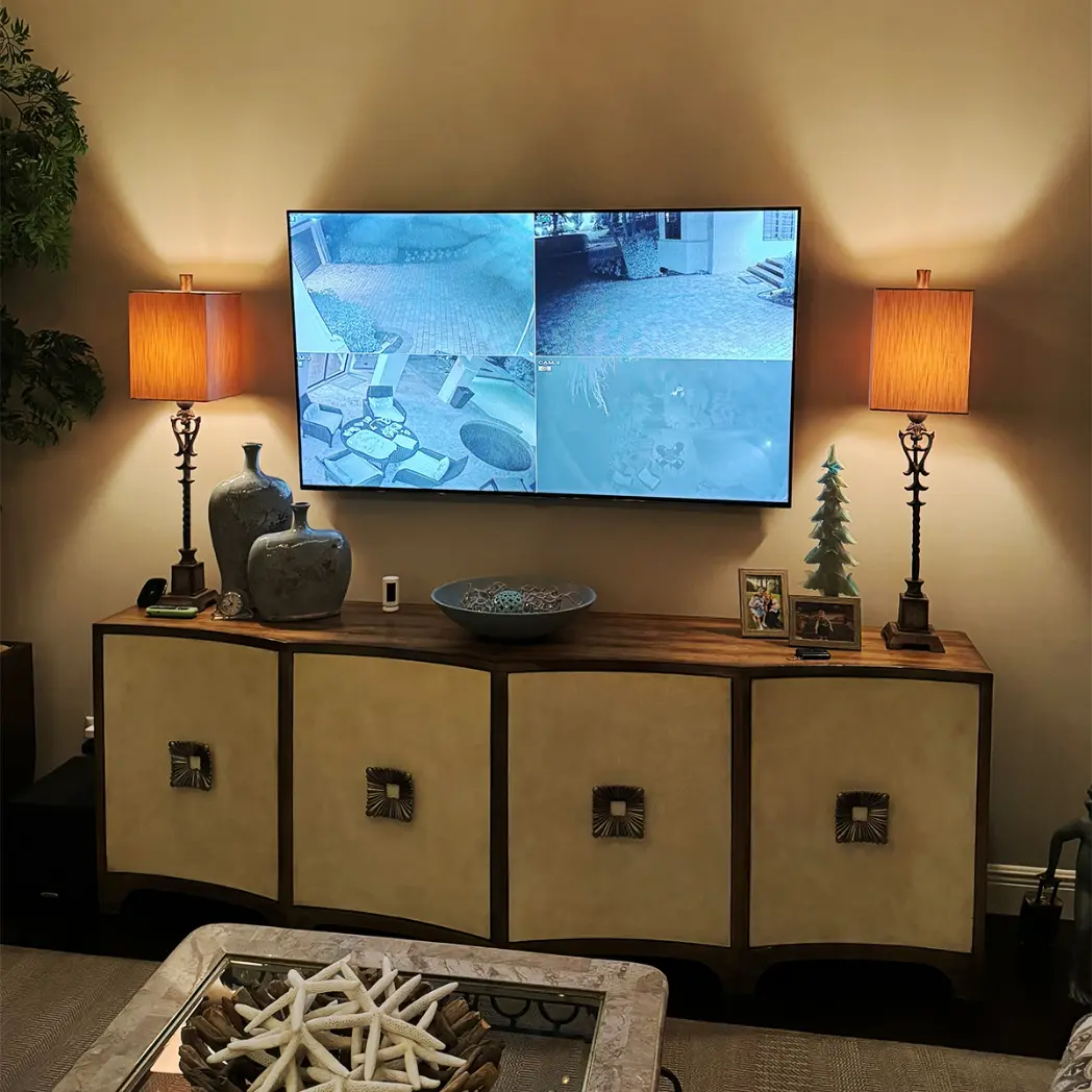 AV setup with surveillance monitoring at second home.