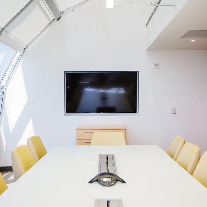 Office conference room TV flush-mount installation.