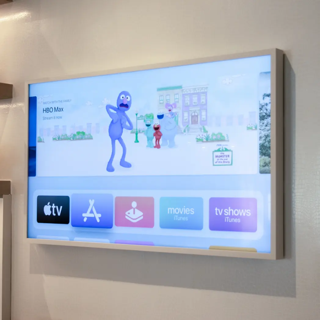 White framed television on wall.