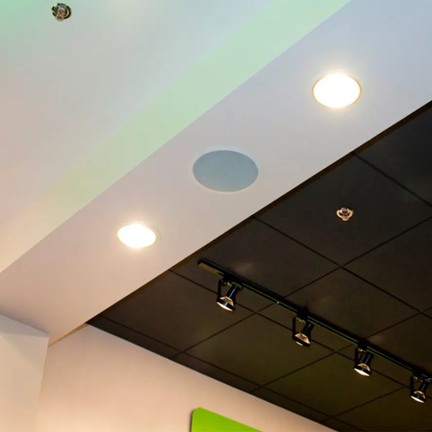 In-ceiling sound system installation at corporate office.