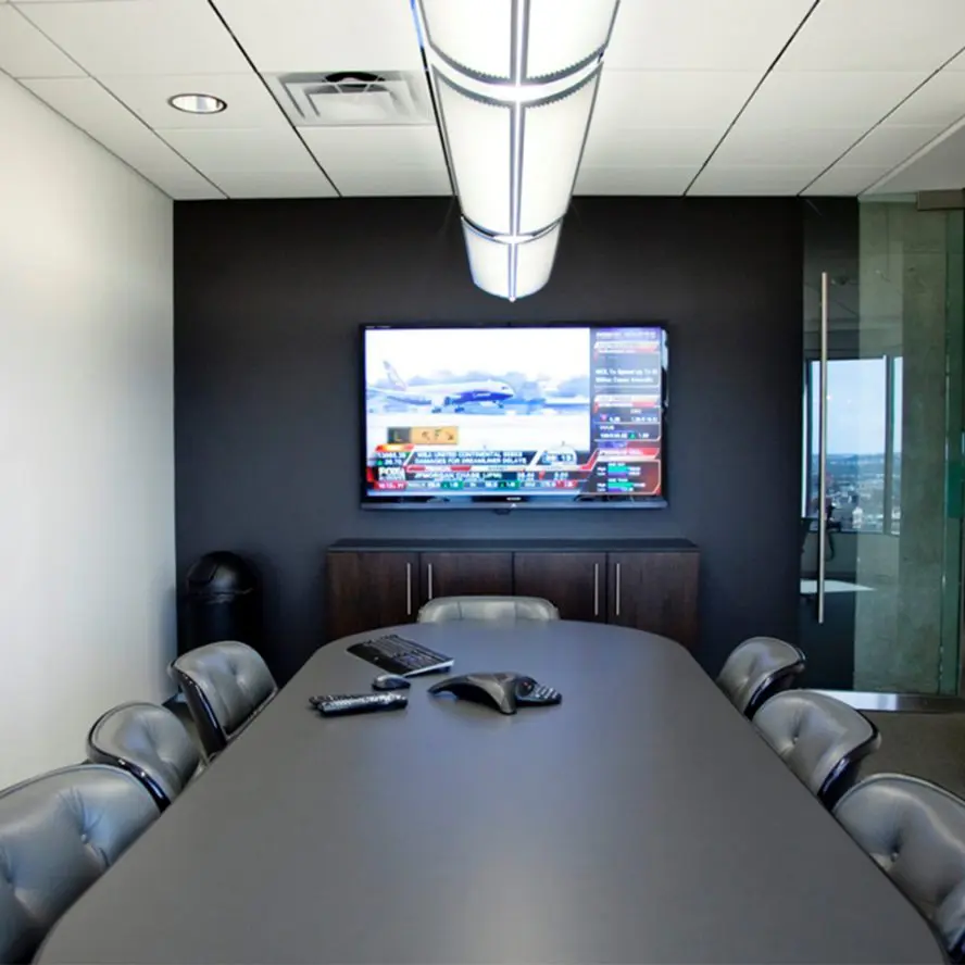 Office conference room AV installation with wireless keyboard, mouse and microphone/speaker. 
