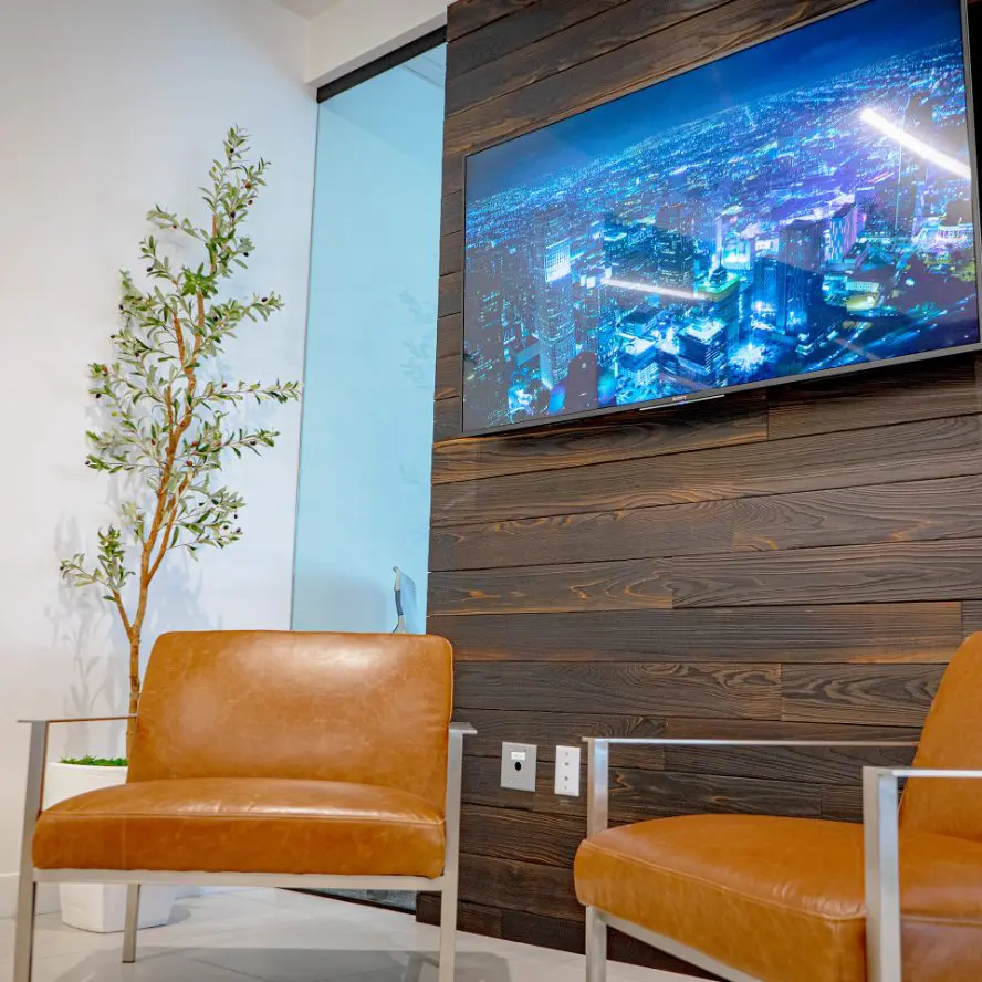 Office lobby with professionally installed television screen.