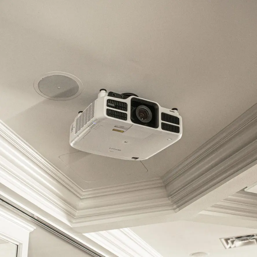 Ceiling mounted projector in home theater. 