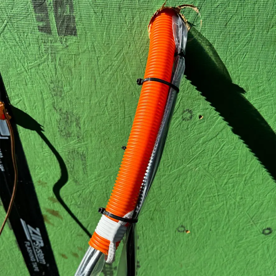 Cabling installation in new home construction, running through wood.