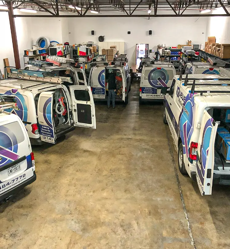 IQueue Media van fleet at Dallas office location.
