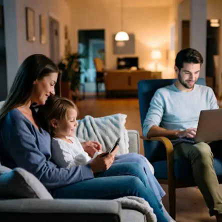 Connected home showing family enjoying their devices